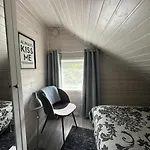 Discover The Ultimate Aurora Escape With A Cozy Outdoor Sauna And Hot Tub