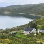 Discover The Ultimate Aurora Escape With A Cozy Outdoor Sauna And Hot Tub Karlsøy