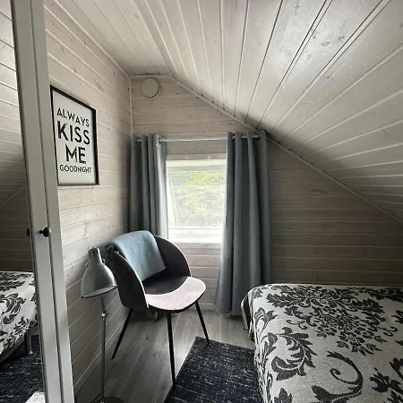 Discover The Ultimate Aurora Escape With A Cozy Outdoor Sauna And Hot Tub