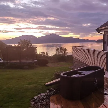 Discover The Ultimate Aurora Escape With A Cozy Outdoor Sauna And Hot Tub