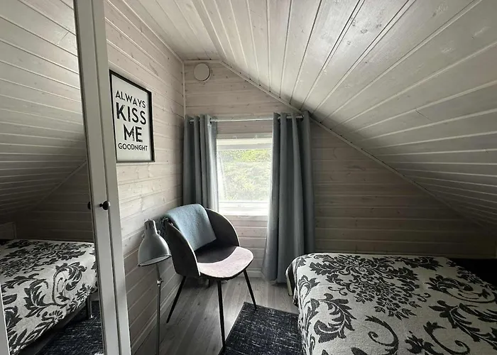 Discover The Ultimate Aurora Escape With A Cozy Outdoor Sauna And Hot Tub