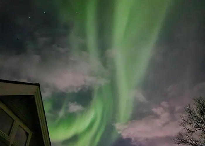 Discover The Ultimate Aurora Escape With A Cozy Outdoor Sauna And Hot Tub