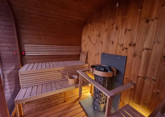 Discover The Ultimate Aurora Escape With A Cozy Outdoor Sauna And Hot Tub Karlsøy