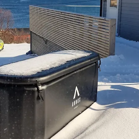 Discover The Ultimate Aurora Escape With A Cozy Outdoor Sauna And Hot Tub